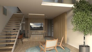 A modern living room with a staircase, a TV, a dining area, and a potted plant.
