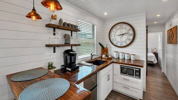 Fridge, microwave, stovetop, coffee/tea maker