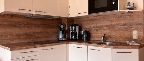 Fridge, microwave, dishwasher, coffee/tea maker