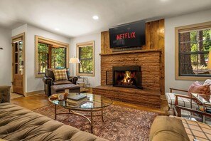 Smart TV, fireplace, books, stereo - Serene Riverside Home: Hot Tub, Fire Pit & Hammock: by Forest & Peak Retreats (Cascade-Chipita Park)