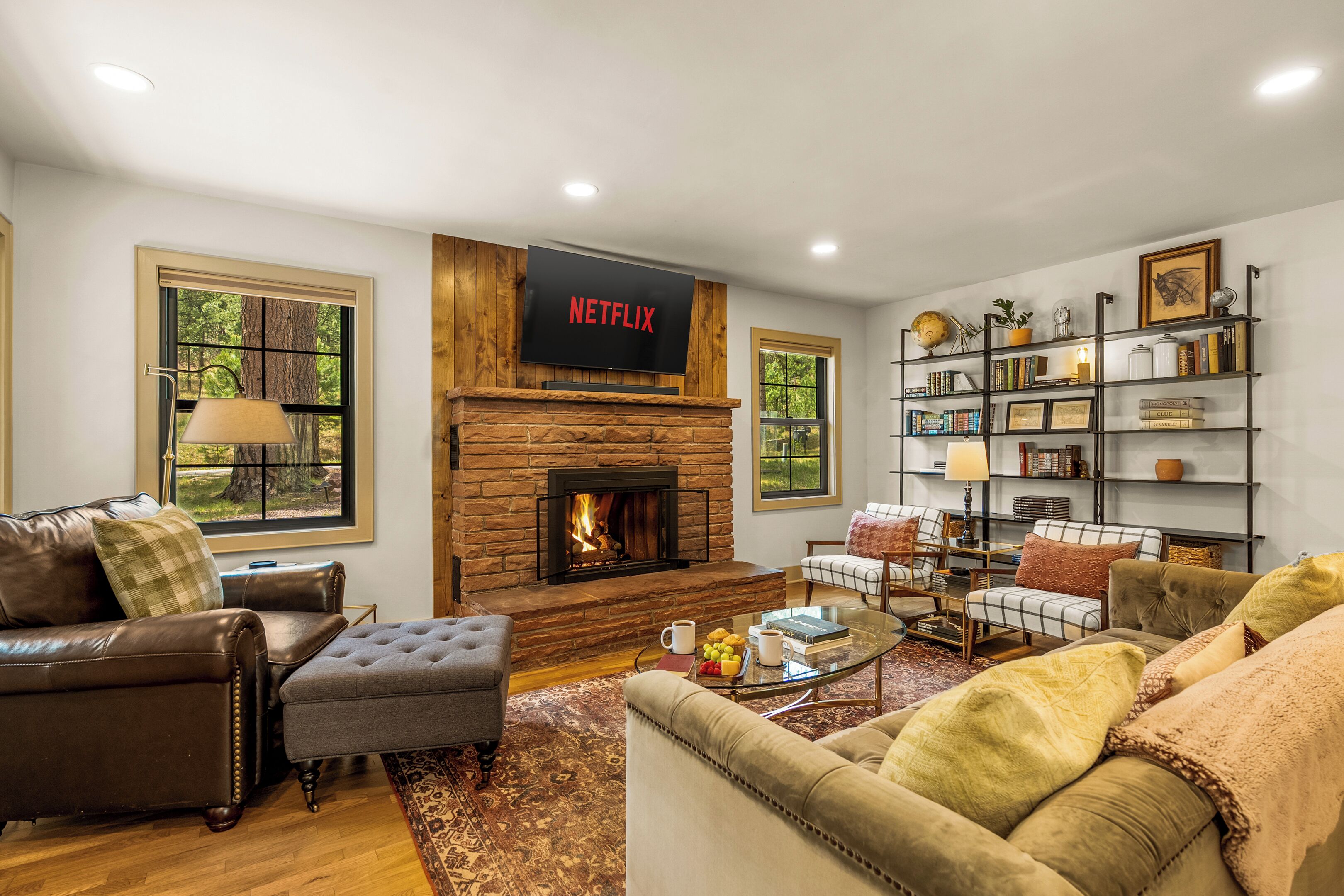 Smart TV, fireplace, books, stereo
