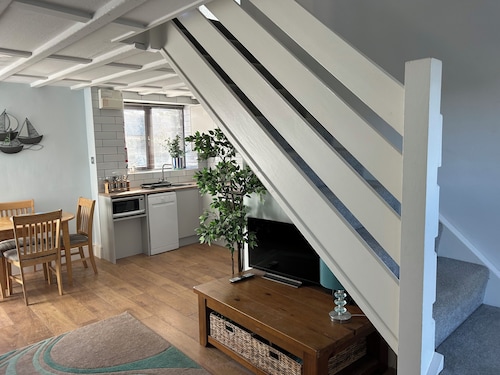 Barn conversion overlooking the golf course to the sea