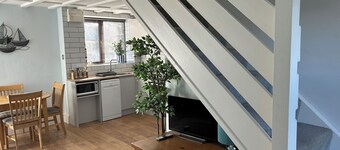 Barn conversion overlooking the golf course to the sea