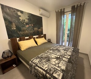 1 bedroom, desk, iron/ironing board, travel crib