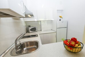 Fridge, microwave, coffee/tea maker, toaster