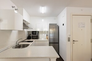 Fridge, microwave, coffee/tea maker, toaster