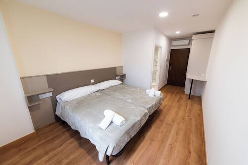 Habitación doble | Baño | Ducha y cabezal de ducha tipo lluvia