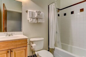 Bathtub, towels, shampoo