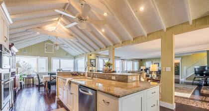 Beautifully updated home on the bay and golf course with dock and raised deck!