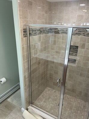 Shower, hair dryer, towels, soap