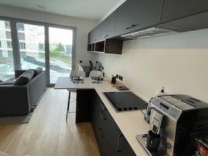 Full-sized fridge, microwave, oven, dishwasher
