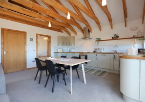Dining - A modern, seafront chalet offering stunning beach views of Belhaven Bay. (Dunbar)
