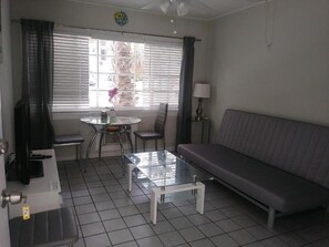 40-inch flat-screen TV with cable channels, TV - Tropical Sky Ranch Motel (Clearwater Beach)