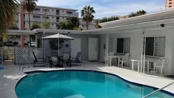 Outdoor pool, open 8:00 AM to 11:00 PM, pool umbrellas, pool loungers