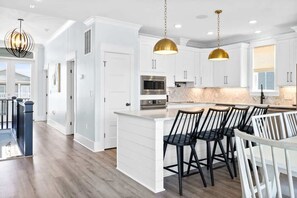 Fridge, microwave, oven, stovetop - Blue Heaven by Brunswick Vacation Rentals: Home with Heated pool & Beach Club (Ocean Isle Beach)