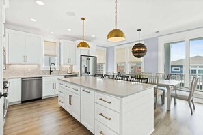 Fridge, microwave, oven, stovetop - Blue Heaven by Brunswick Vacation Rentals: Home with Heated pool & Beach Club (Ocean Isle Beach)