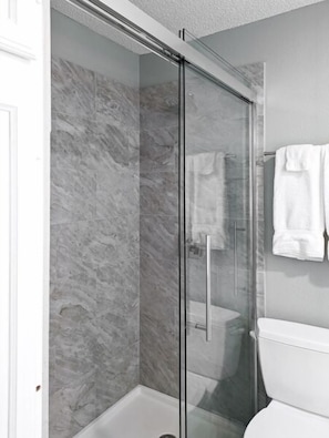 Shower, towels, soap, shampoo