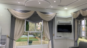 Deluxe Double Room | Minibar, desk, laptop workspace, blackout drapes