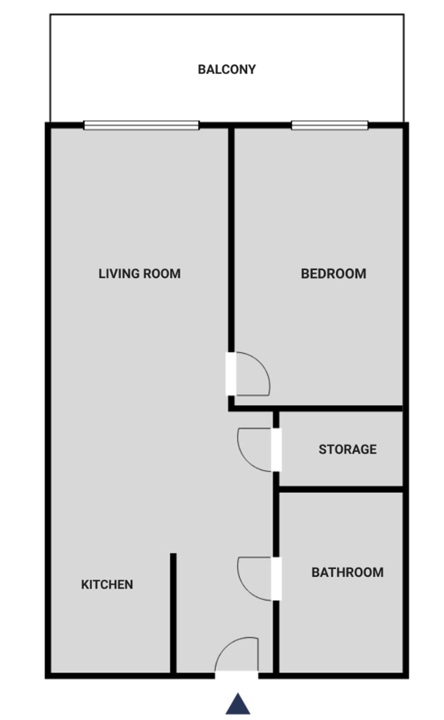 A floor plan with a living room, bedroom, balcony, kitchen, storage, and bathroom.
