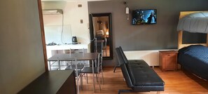 Family Cabin | Living area | 32-inch flat-screen TV with satellite channels, TV - Cabañas Rústico Punucapa (Valdivia)