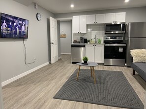 Fridge, microwave, oven, stovetop - Guest Home in Regina -- Feels like Home (Regina)