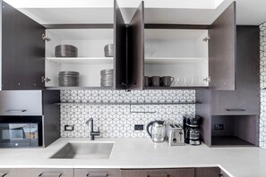 Fridge, microwave, oven, stovetop - Deluxe East Village 2BR w/ Elevator & W/D, nr Union Square, by Blueground (New York)