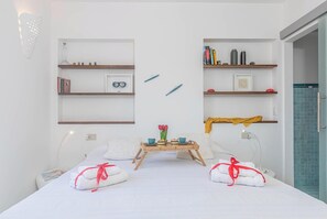 2 habitaciones, tabla de planchar con plancha y ropa de cama