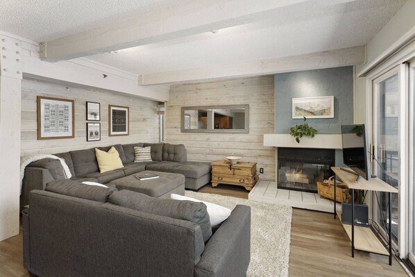 Condo (Snowmass Mountain D1) | Living area | 30-inch flat-screen TV with cable channels, fireplace
