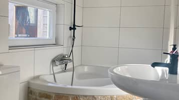 Bathtub, hair dryer