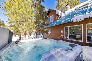 Soak under the pines in the private year-round hot tub—the perfect place to unwind after skiing, hiking, or exploring. Professionally cleaned for every group, every time. - 6BR Tahoe Cabin, Hot Tub, Game Room, Near Heavenly (South Lake Tahoe)