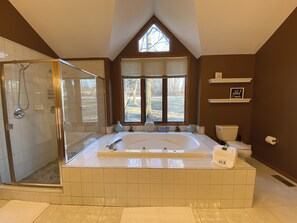 Jetted bath, hair dryer, towels, soap