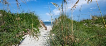 Steps to Sand! New Updates! Sunroom, Suites, Walk to Restaurants, Shops, Pier! $300 in Free Tickets!