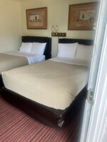 Double Room | Desk, blackout drapes, iron/ironing board, free WiFi