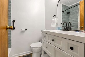 Bathtub, hair dryer, towels