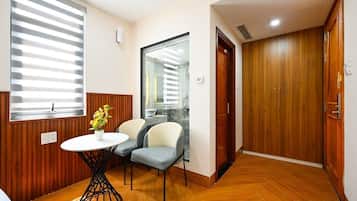 Superior Room | Living area | 42-inch flat-screen TV with cable channels, TV, fireplace