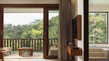 Valley Suite With Pool View | Living area | 55-inch Smart TV with digital channels, TV