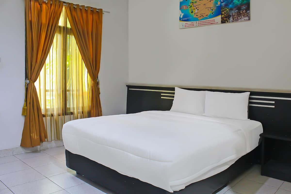 A neatly made bed with white bedding in a room with a tiled floor and a window with curtains.