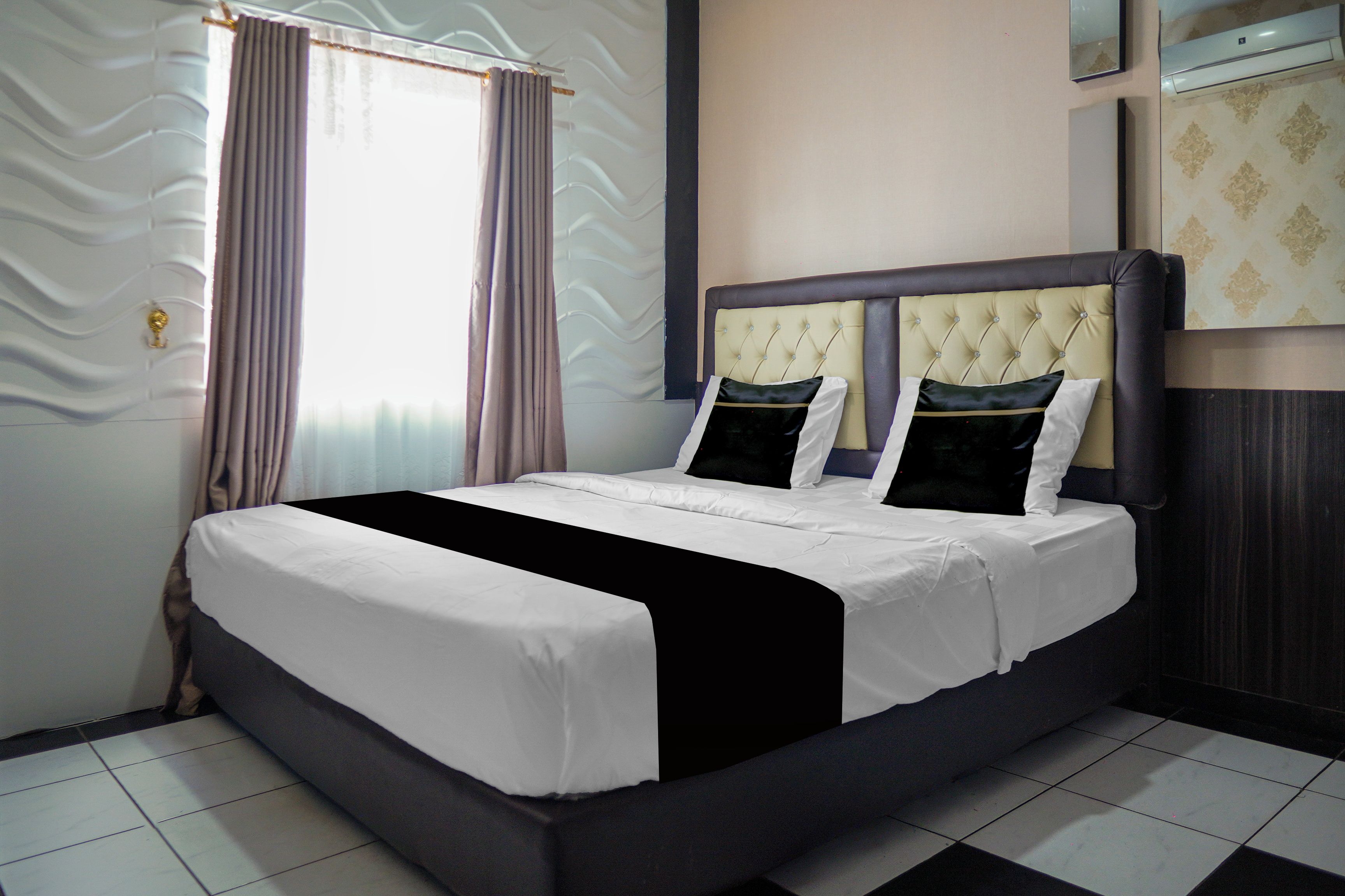 Foto - Super OYO 4010 Zaara Guest House Syariah