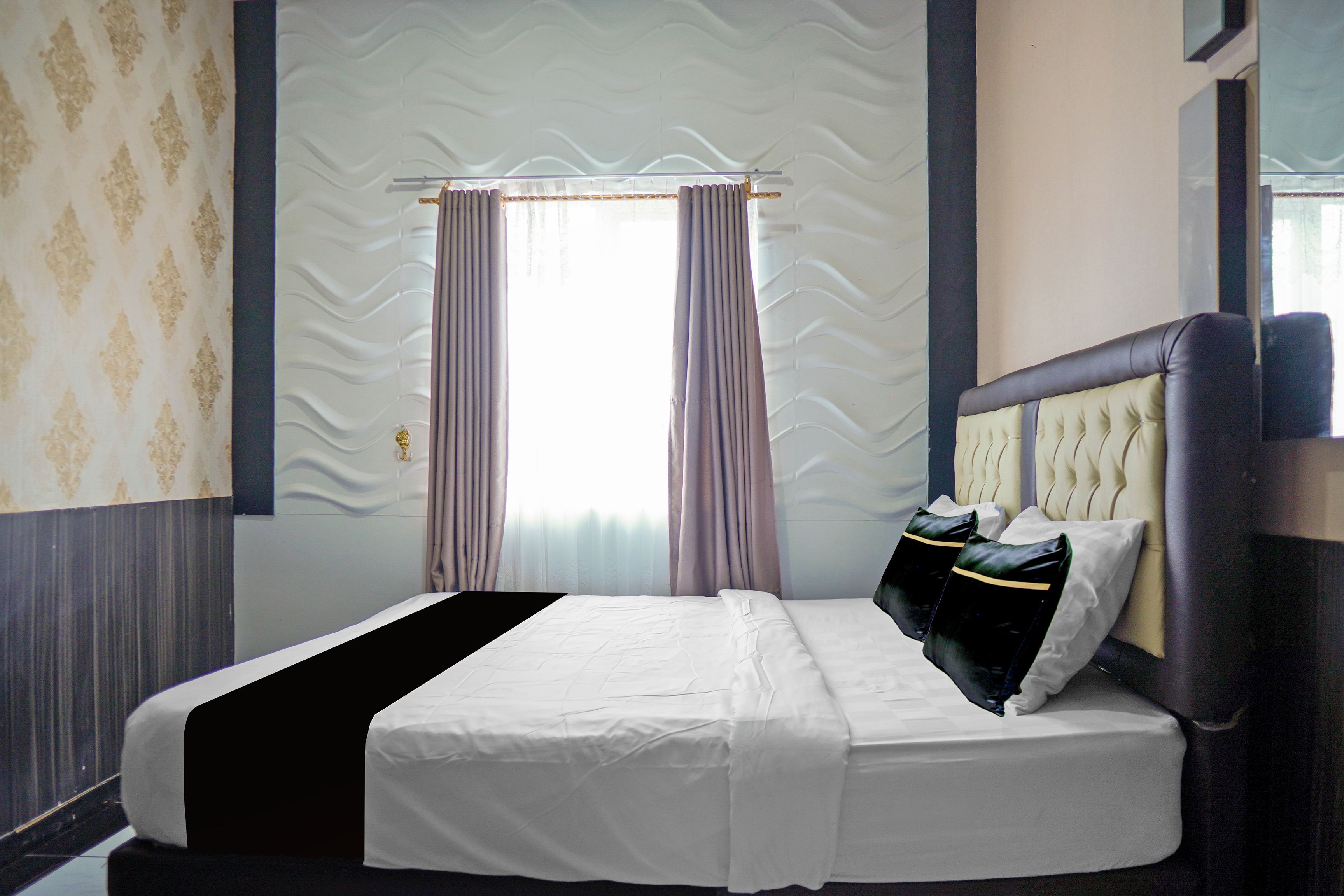 Foto - Super OYO 4010 Zaara Guest House Syariah