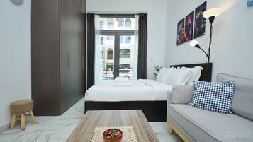 Family Studio, 1 King Bed, Non Smoking, Terrace | Living area | 48-inch flat-screen TV with digital channels, TV