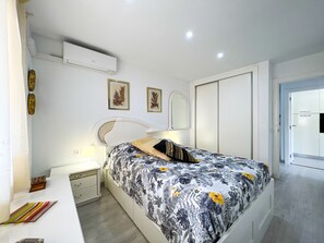1 dormitorio, tabla de planchar con plancha, wifi gratis y ropa de cama