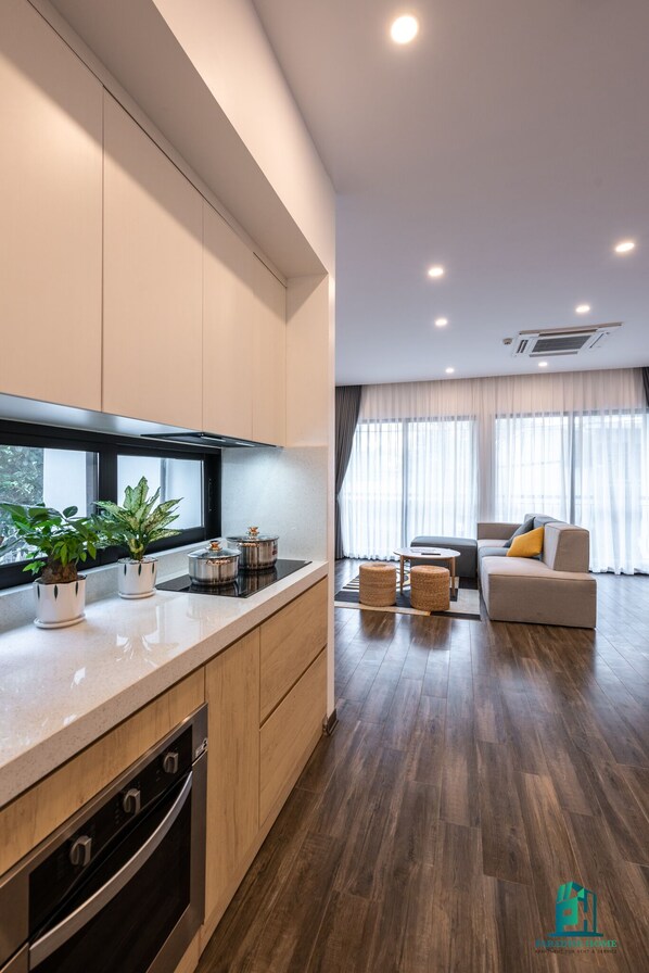 Deluxe Apartment | Living area | 43-inch Smart TV with digital channels, TV - Paradise Home 5 Tu Hoa (Hanoi)