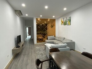 City Apartment | Living area | 43-inch Smart TV with digital channels, TV - Paradise Home Ton Duc Thang (Hanoi)