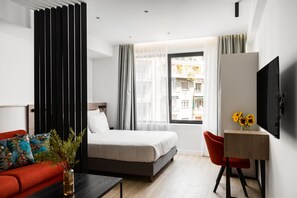 Appartement Deluxe | Aire de séjour | Téléviseur connecté