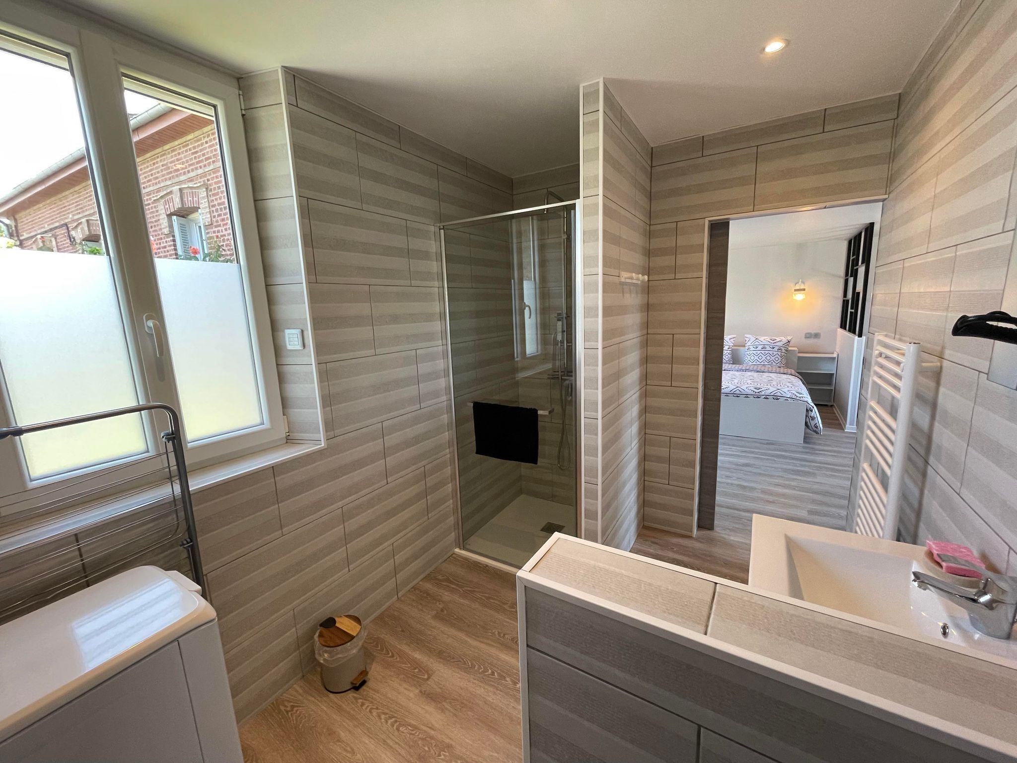 Shower, hair dryer, soap, toilet paper