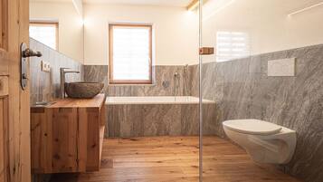 Bathtub, hair dryer, towels