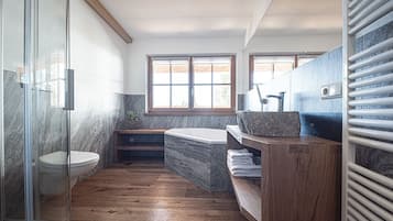 Bathtub, hair dryer, towels