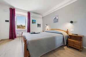 1 chambre, fer et planche à repasser, Wi-Fi gratuit, draps fournis