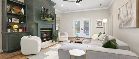 Televisie, een open haard, tafelvoetbal en een kantoor