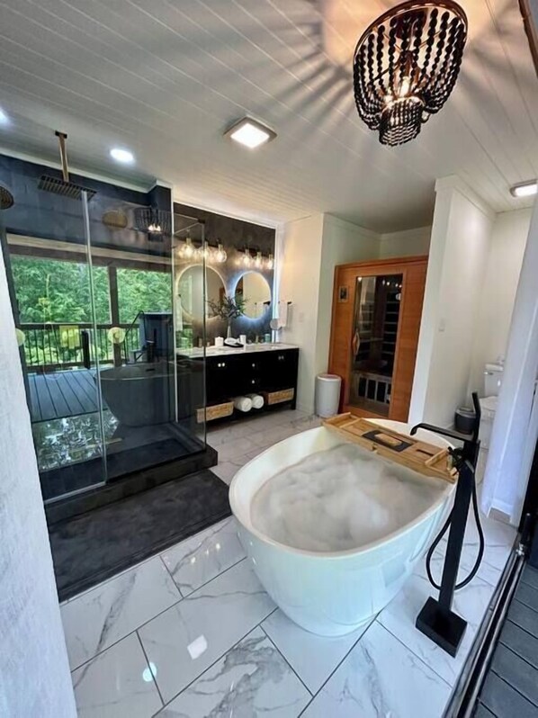 Bathtub, towels, soap, shampoo